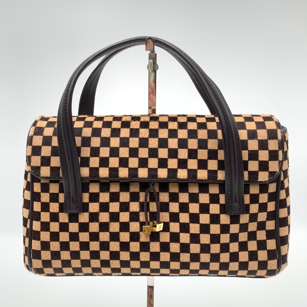 Louis Vuitton Lionne Damier Sauvage Handbag